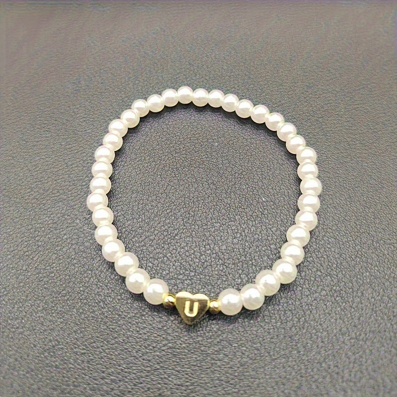 Elegantiška apyrankė su inicialo širdele (A–Z)