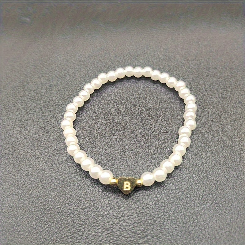 Elegantiška apyrankė su inicialo širdele (A–Z)