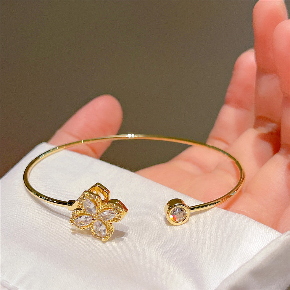 Gleam rotating petal bangle