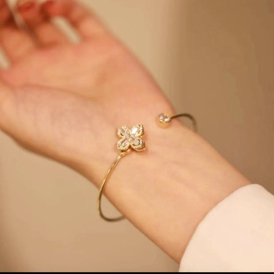 Gleam rotating petal bangle