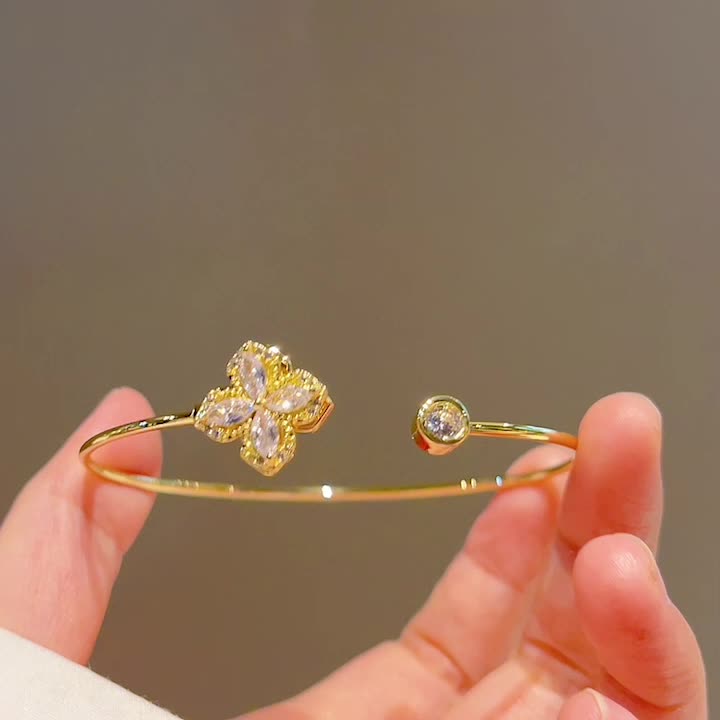 Gleam rotating petal bangle