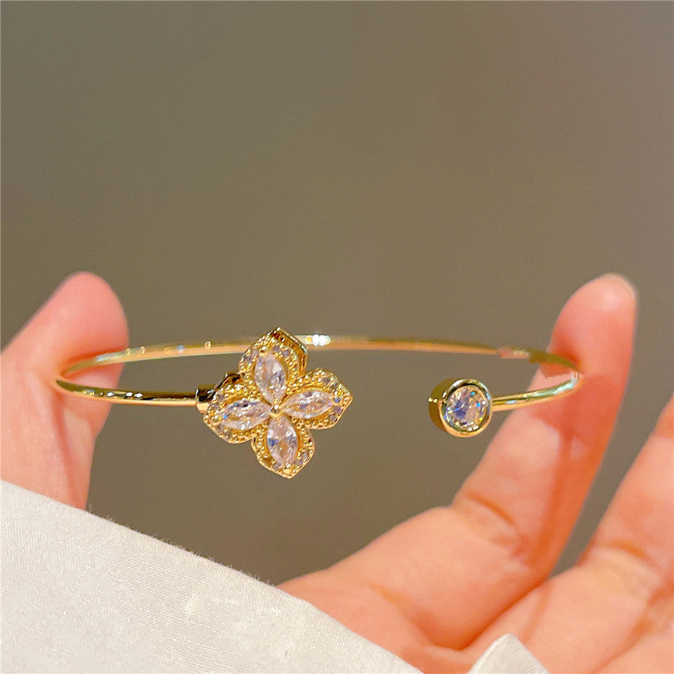 Gleam rotating petal bangle