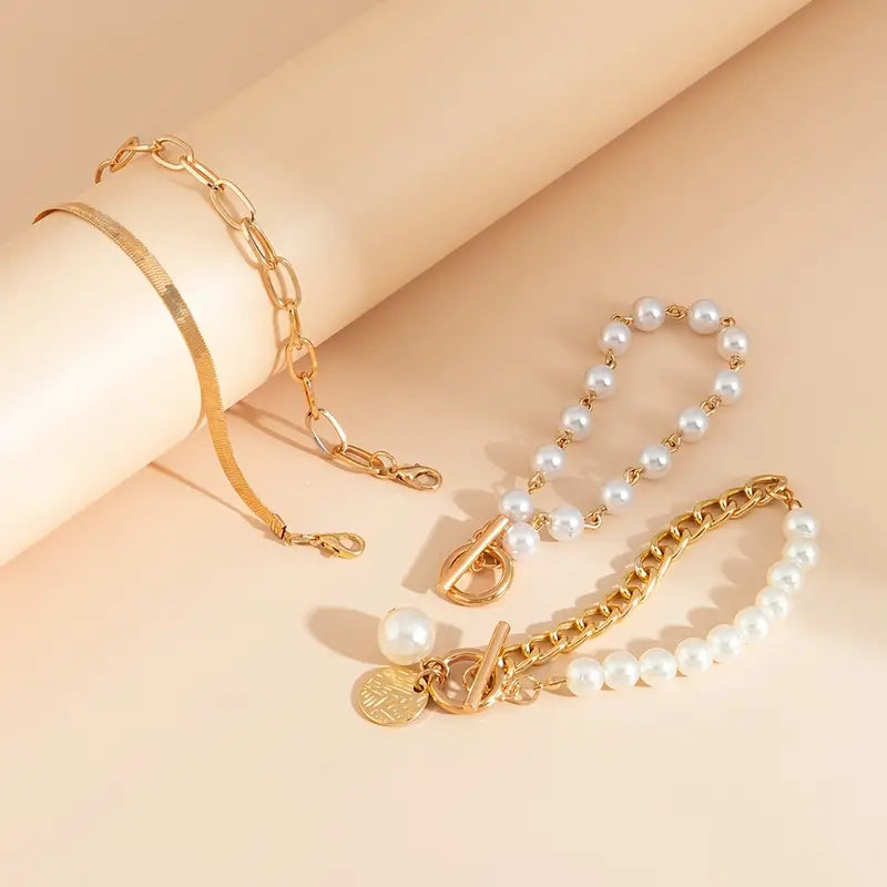 Chic auksinis 4-piece apyrankių rinkinys - snake, pearls & links | Auksinis
