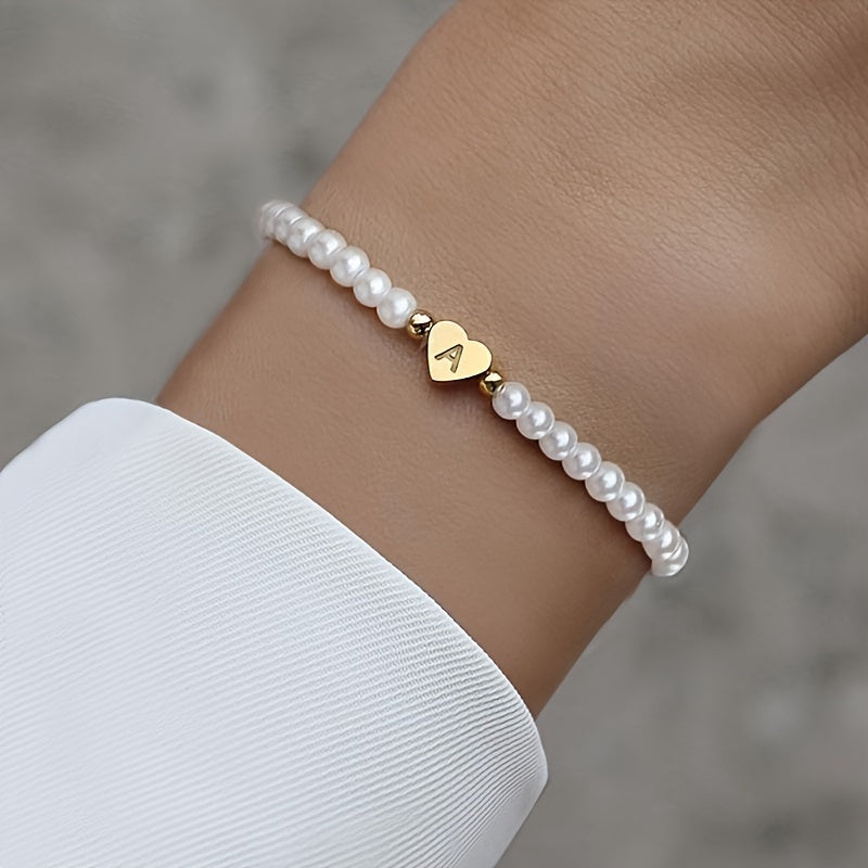 Elegantiška apyrankė su inicialo širdele (A–Z)