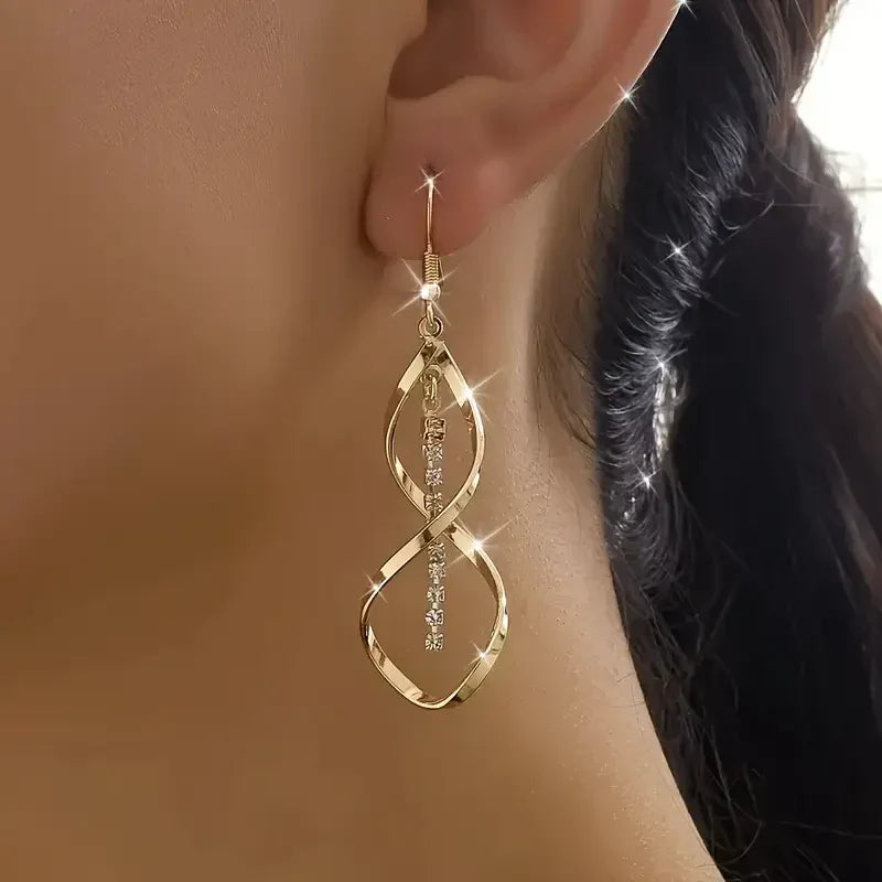 Sunbeam spiral auskarai | Auksinis