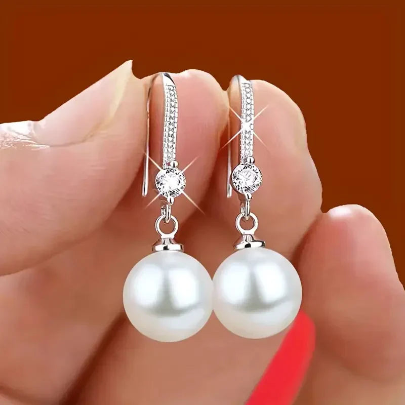 Lustrous cirkonis perlas kabantys auskarai | Baltas auksinis