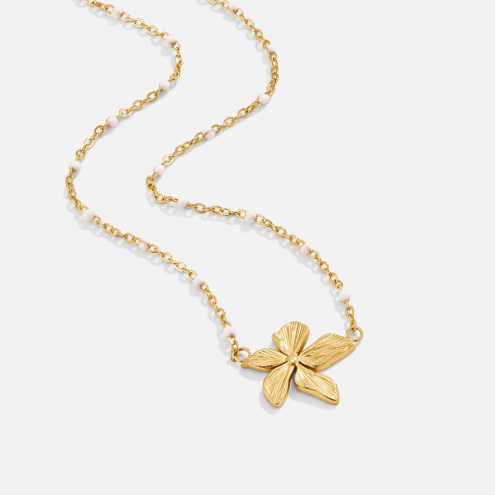Elegantiška auksinė grandinėlė su gėle